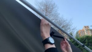 Vehicle side awning tent deployed on a 4WD